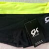 GK CHILD MEDIUM BLACK NYLON/SPANDEX YELLOW WAISTBAND GYMNASTS WORKOUT SHORTS CM
